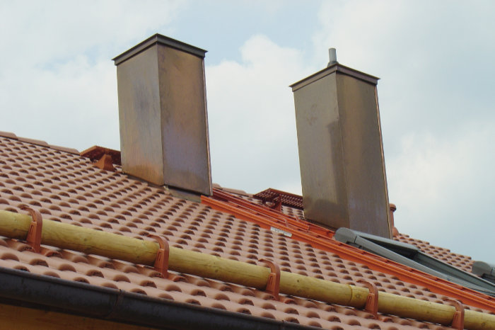Dachdeckungen mit Dachziegel, Trapezblech und Sandwichblech 