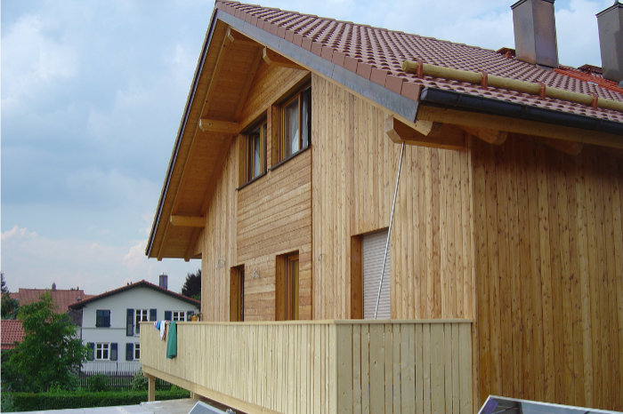 Bild vom Haus mit Holzfassade